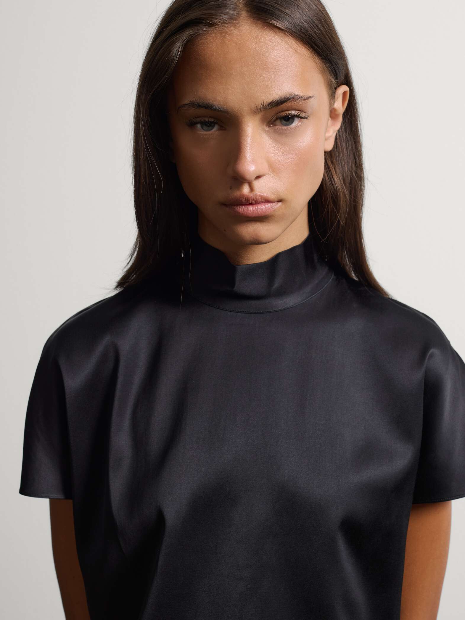003571741_SD1 STEFANEL Hort-sleeved viscose-blend blouse with high neck Black - Image 1